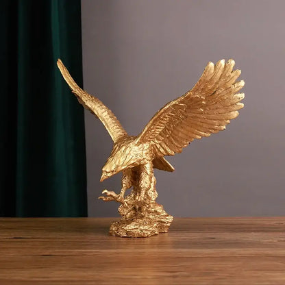 Golden dapeng eagle wings resin statue with detailed feather texture perched on rocky base for office decorbites decor