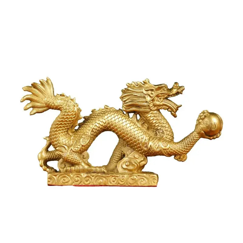 Golden dragon phoenix zodiac ornament with intricate copper scales and flowing mane holding a sphere for living room decor