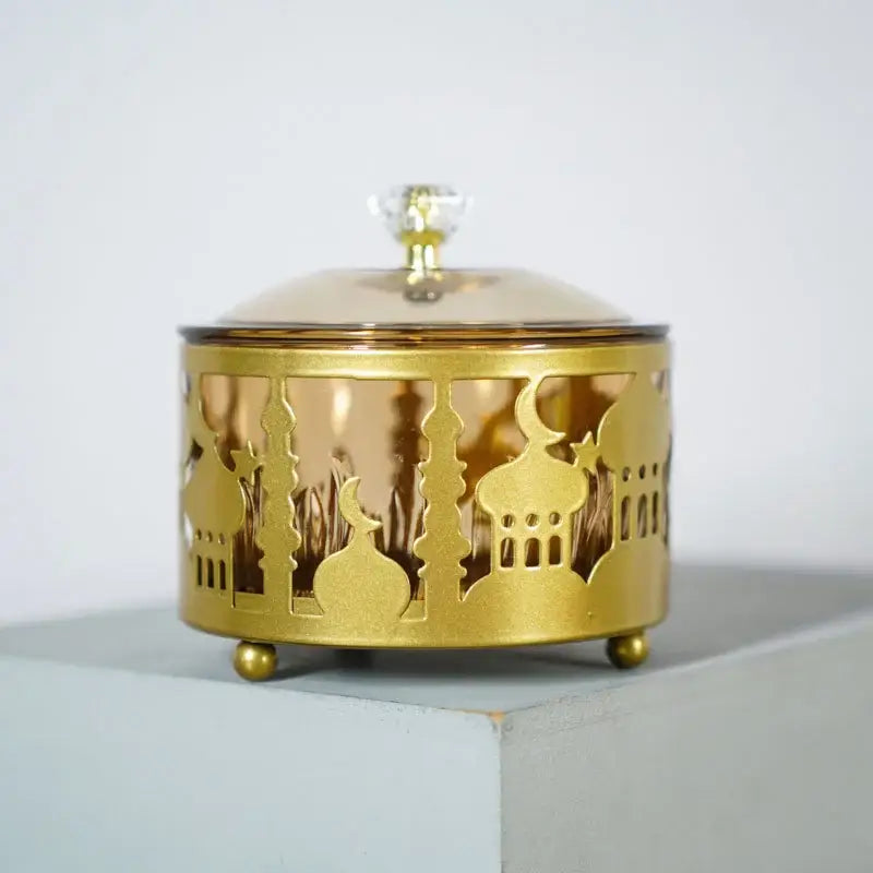 Golden eid mubarak metal snack tray with intricate islamic cut-out patterns and a clear glass lid with crystal knob