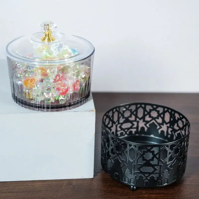 Clear glass candy jar with gold-toned crystal knob lid filled with colorful gummies for eid mubarak metal snack tray