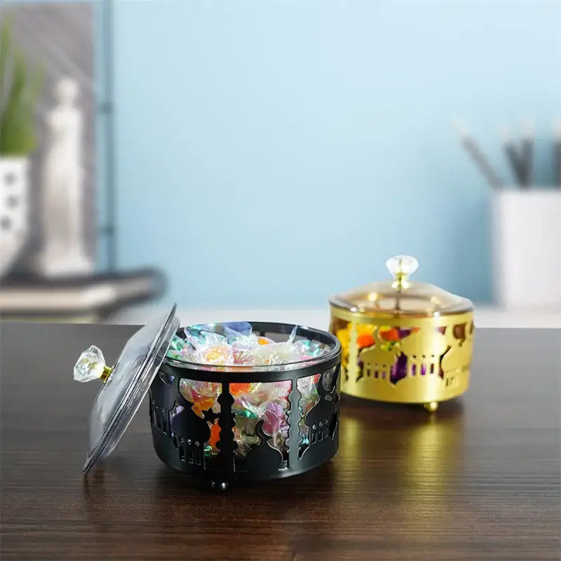 Black metal snack tray with ornate cut-out patterns and clear glass lid with crystal knob for eid mubarak metal fruit use