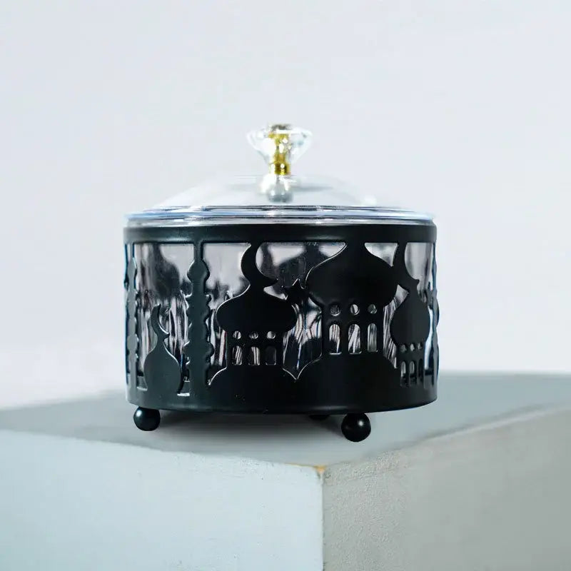 Black metal eid mubarak metal snack tray with mosque silhouette cutouts and crystal knob clear glass lid
