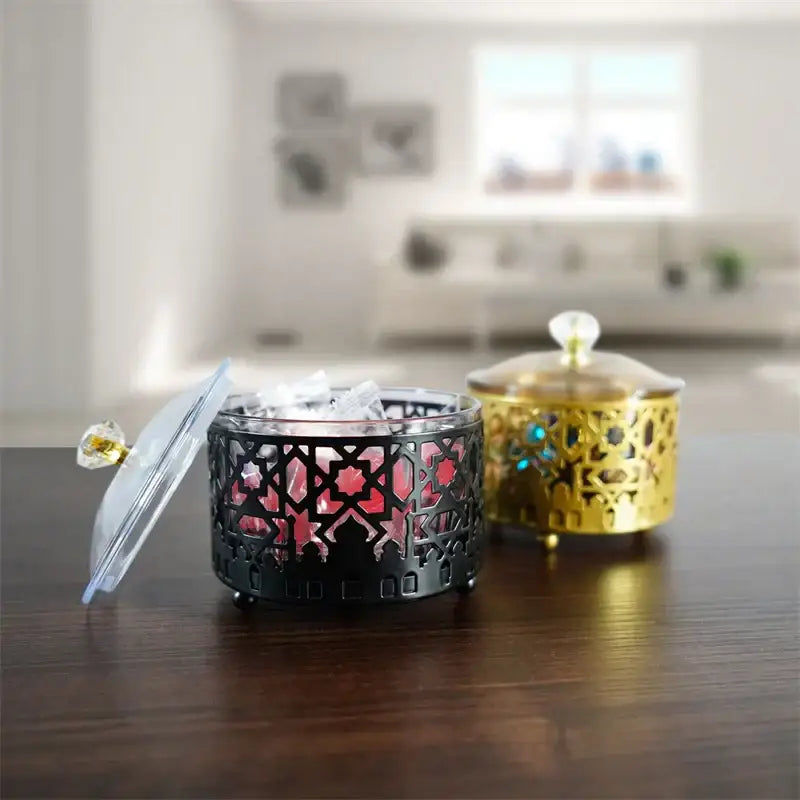 Black metal eid mubarak metal fruit snack tray with intricate geometric cutouts and clear glass lid with crystal knob