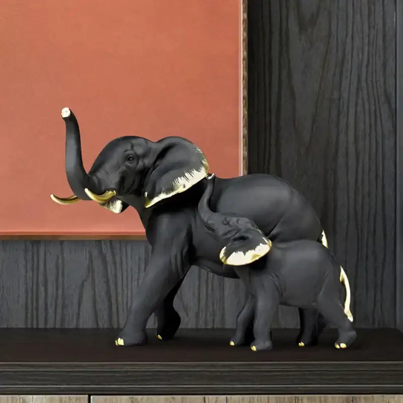Black elephant and calf resin figurine with gold-trimmed ears tusks and feet decorbites elephant resin living room decor