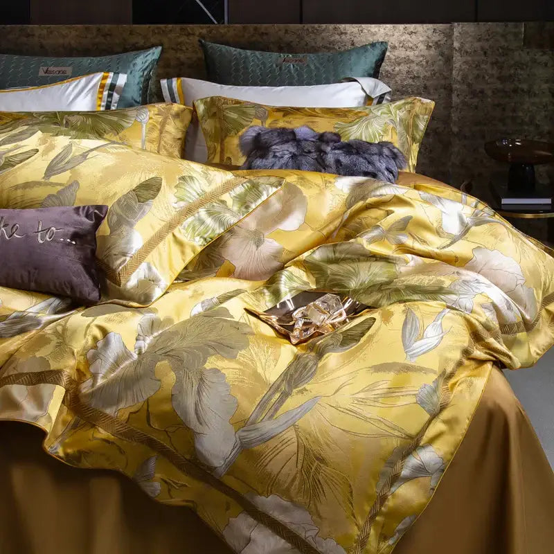 Luxurious golden floral satin jacquard bedding set with elegant botanical print in muted greens and creams by decorbites