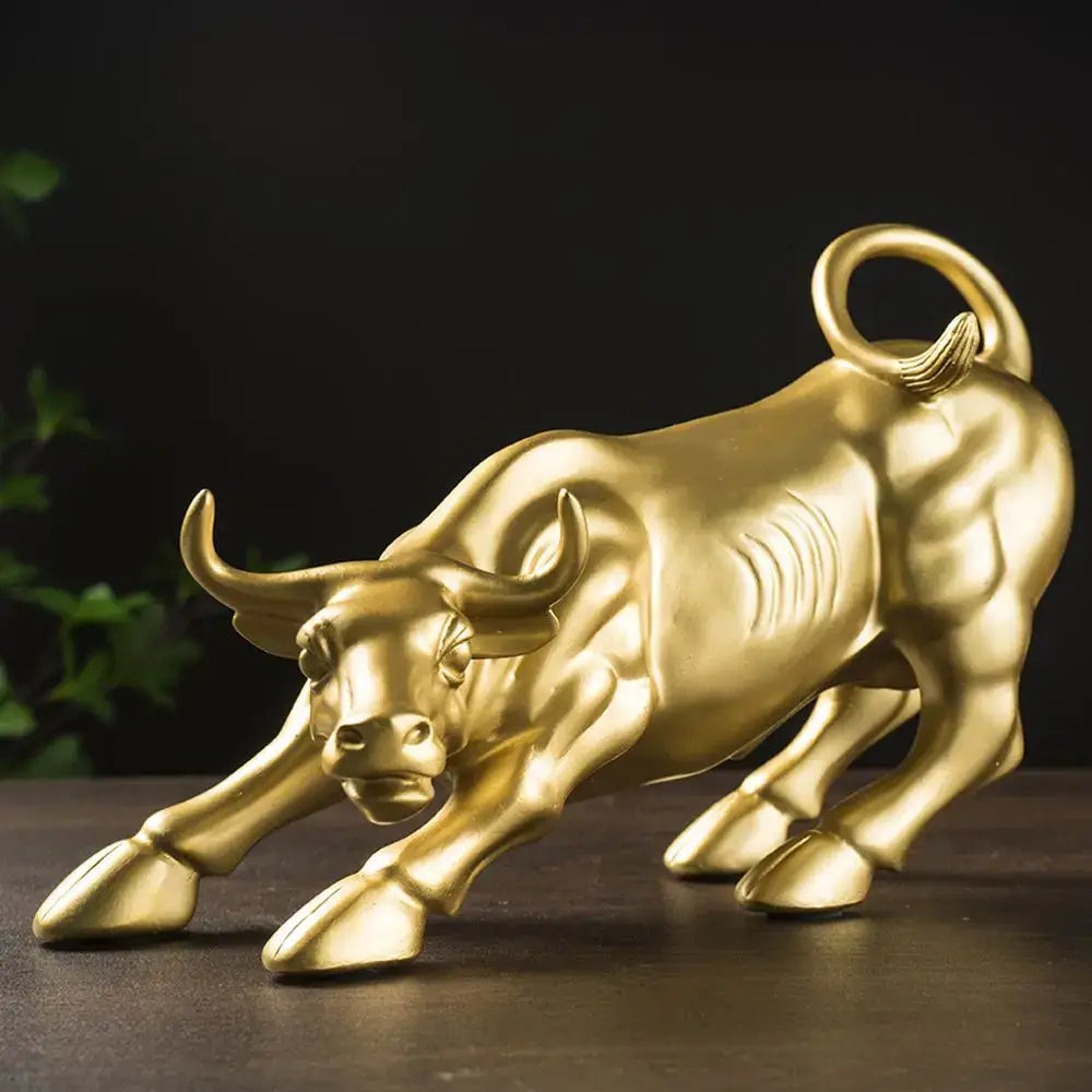 Golden metallic fortune resin sculpture bull with detailed musculature and curved horns for office desk decor