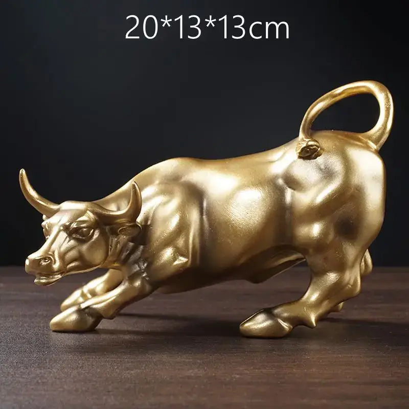Golden fortune resin sculpture of a metallic bull with polished surface and detailed musculature for office desk decor
