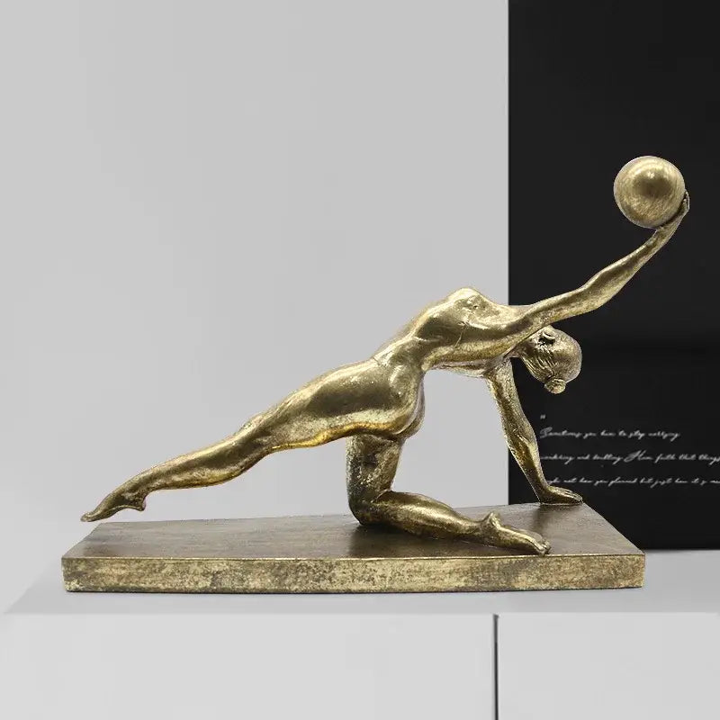Golden gymnast figurine metallic sculpture of athletic woman holding ball ideal for decorbites golden gymnast decor