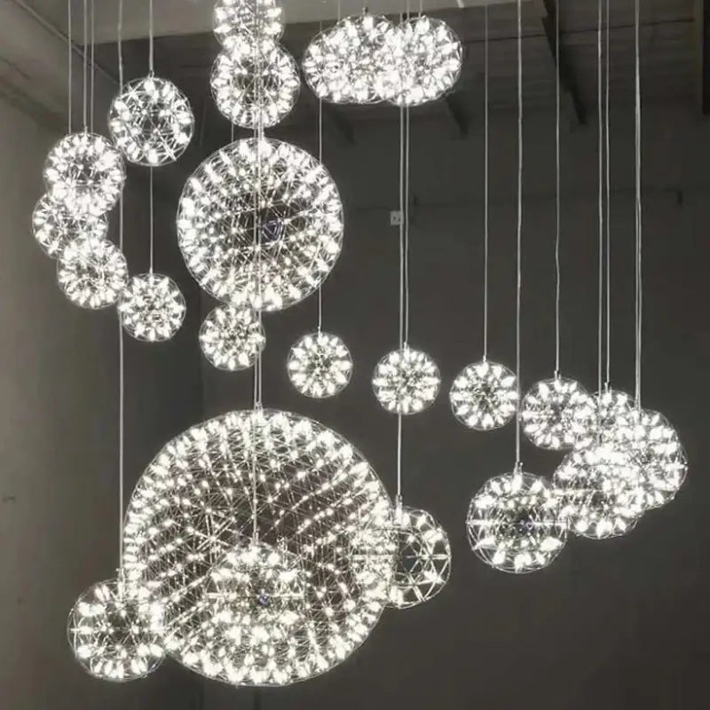 A modern golden gypsophila sparkball pendant chandelier with bright white led lights in geometric web pattern