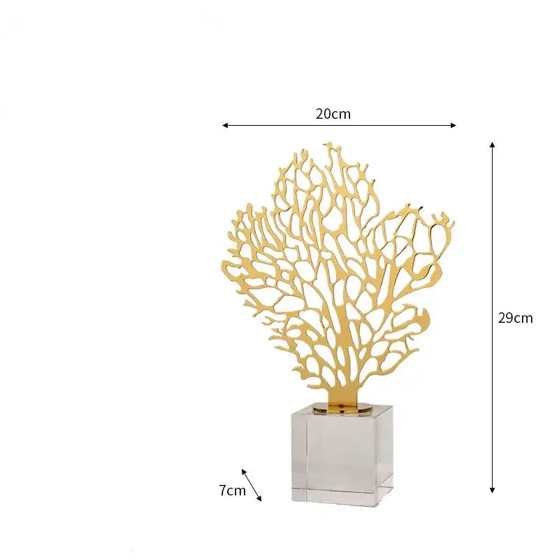 Gold-colored metallic hollow tree coral sculpture on clear acrylic base for decorbites golden hollow tree living room decor
