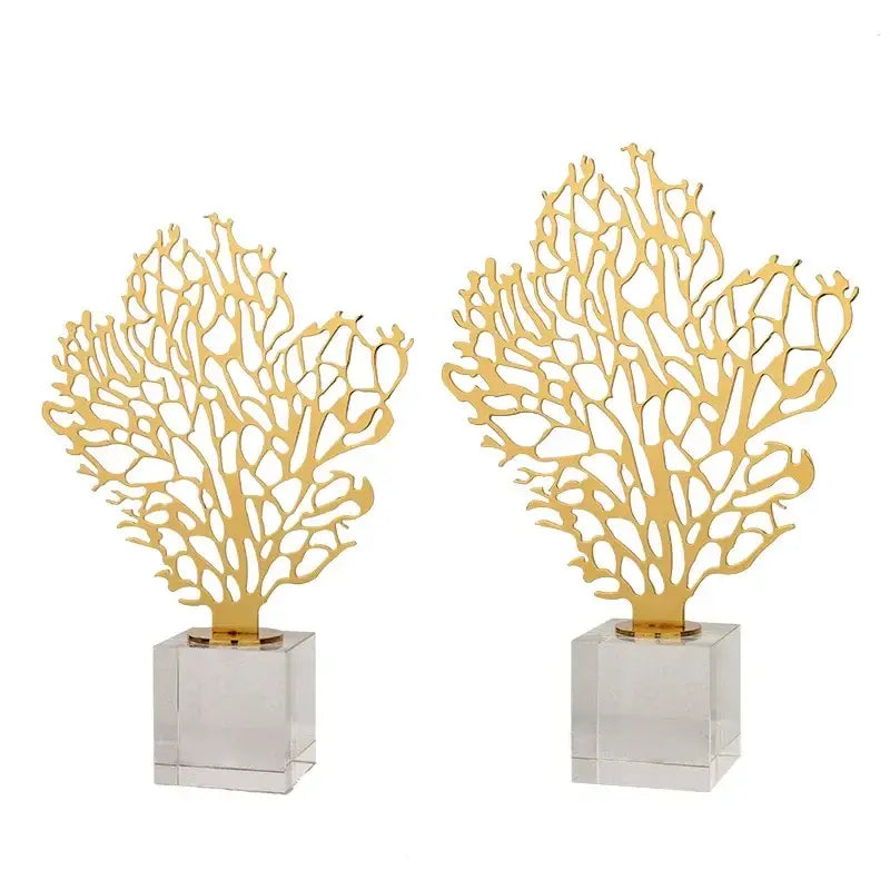 Golden hollow tree coral sculpture with intricate cut-out patterns on clear acrylic bases for living room decorbites decor