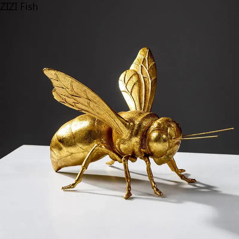 Golden honeybee insect statue with detailed metallic wings and legs for living room decor by decorbites golden honeybee