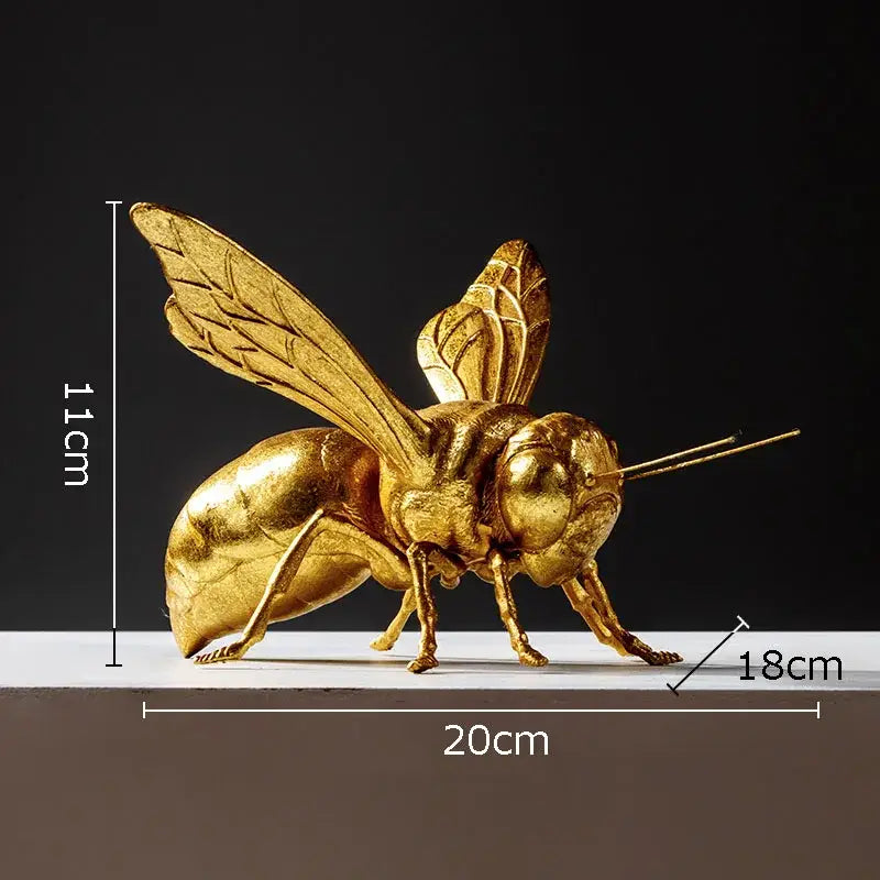 Golden honeybee insect statue with detailed wings and segmented body in metallic finish for living room decorbites decor