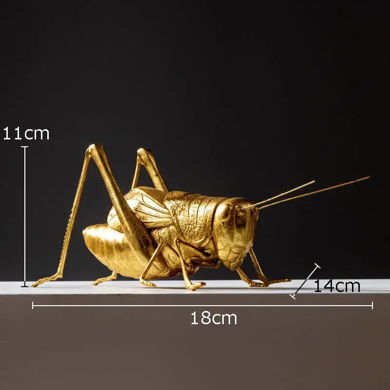 Golden metallic grasshopper insect statue with intricate lifelike textures and articulated limbs for decorbites golden honeybee decor