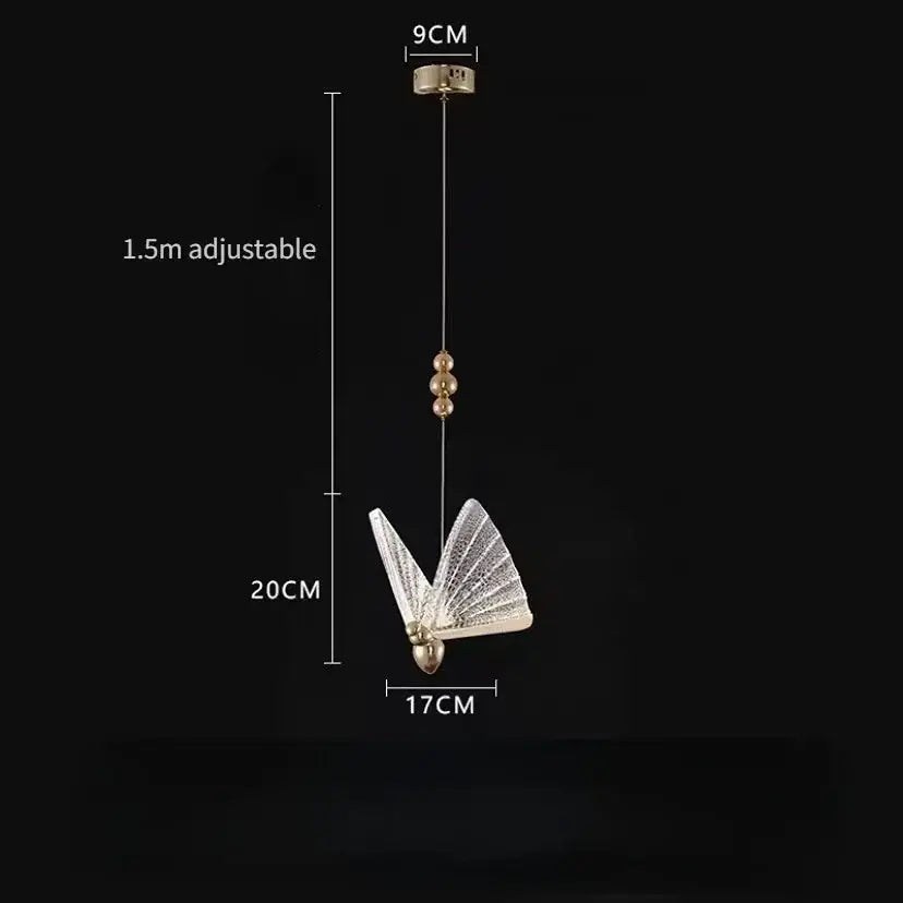 Golden iridescent crystal butterfly pendant lamp with gold-toned accents and adjustable chain for bedroom lighting decorbites crystal butterfly
