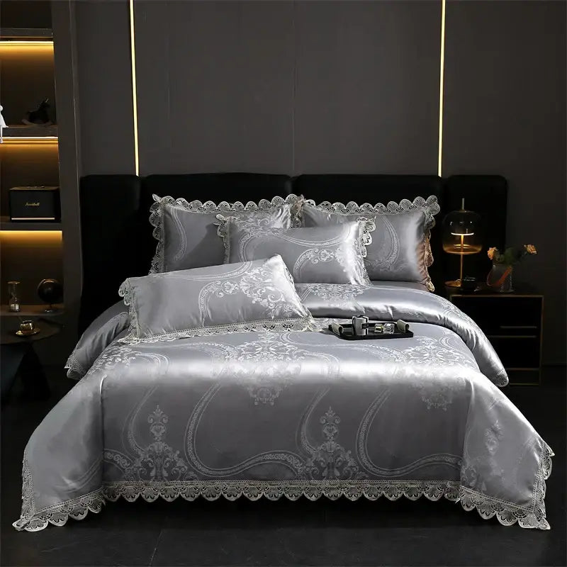 Silver satin bedding set with intricate white lace trim and ornate embroidery in decorbites golden jacquard cotton design