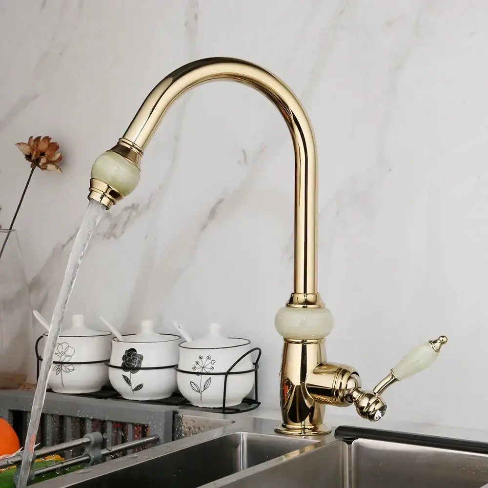 Golden jade and diamond handle kitchen faucet with gold finish, curved spout, and ceramic handles for modern sinks
