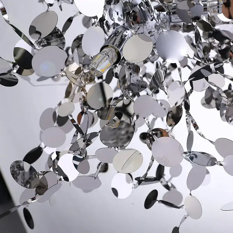 Modern pendant light with reflective oval metallic discs in cascading design golden leaf decorbites g9 leaf light