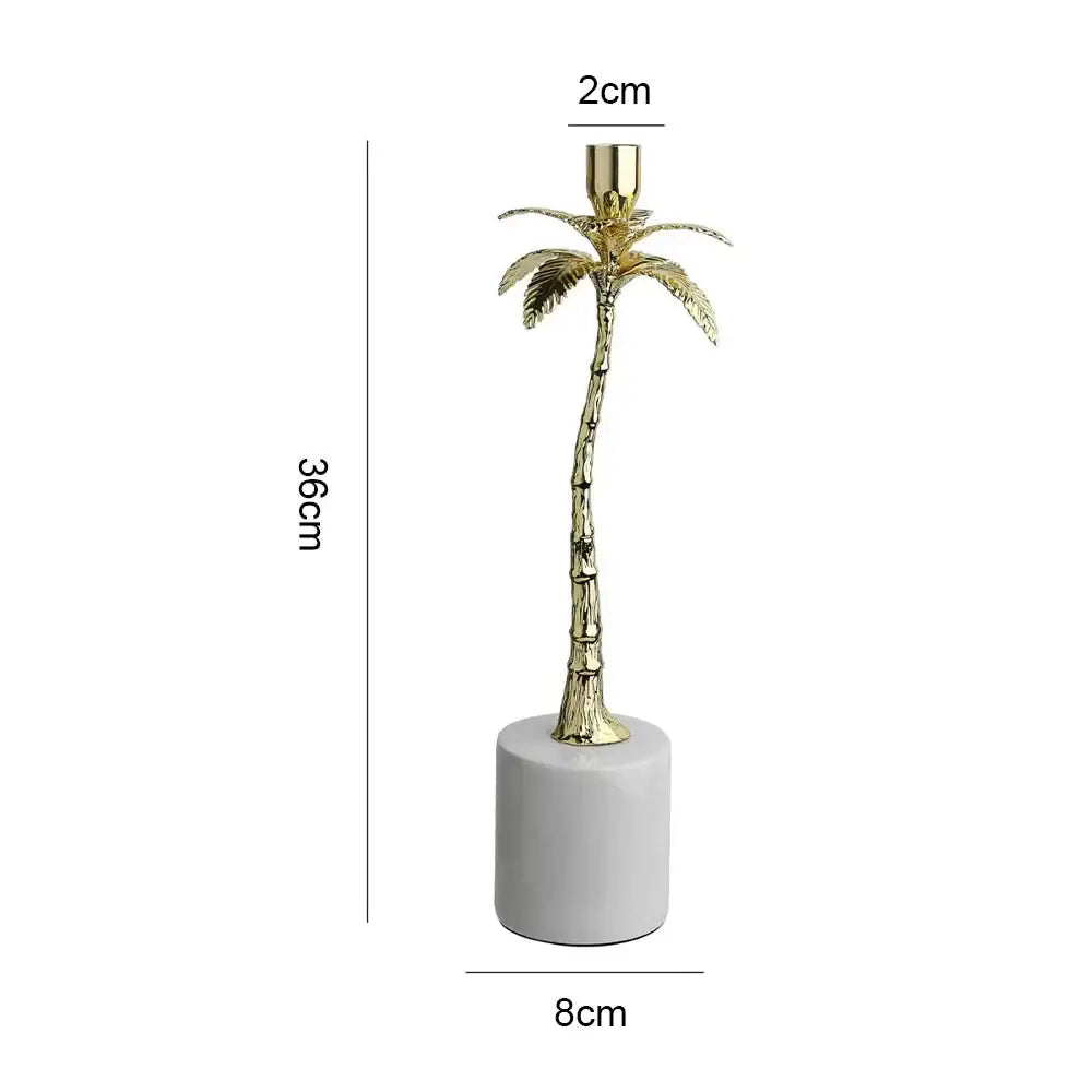 Golden metal candlestick palm tree with cylindrical white marble base for elegant home decor by decorbites