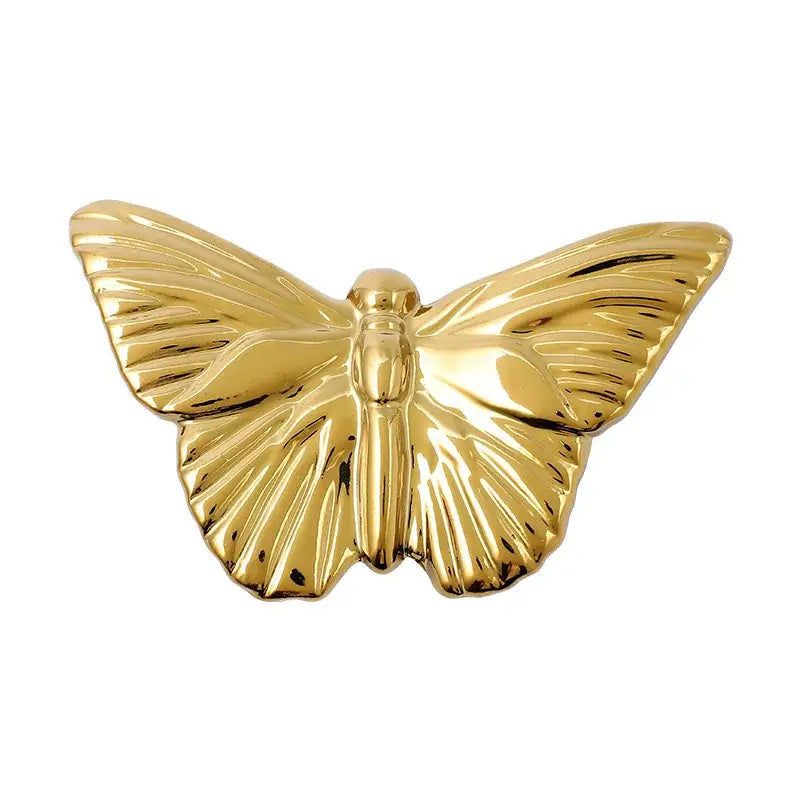 Golden metallic butterfly wall decoration set with detailed wing ridges and polished finish for living room decor