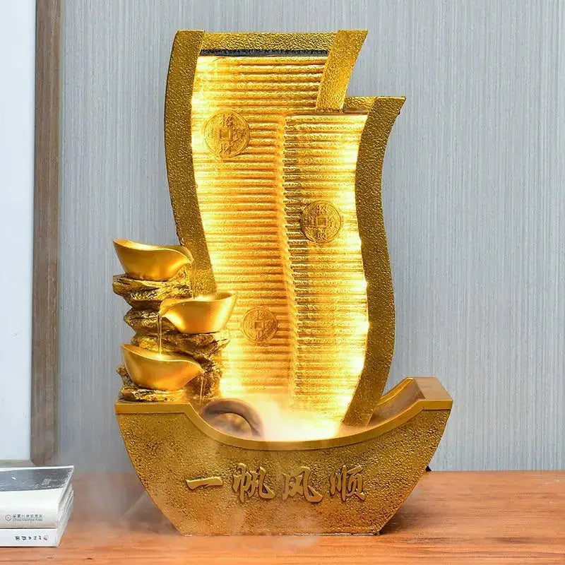 Golden metallic circulating water fountain with embossed coins and stacked ingots featuring illuminated cascade for decorbites circulating water wealth decor