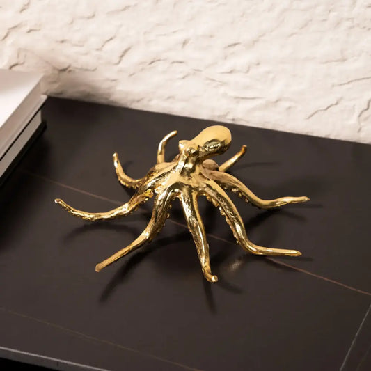 Golden octopus metal sculpture with detailed articulated limbs and polished finish for living room decorbites decor