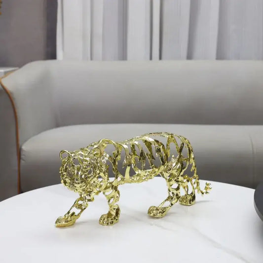 Golden openwork animal sculpture tiger figurine with intricate wireframe design perfect for living room decorbites decor