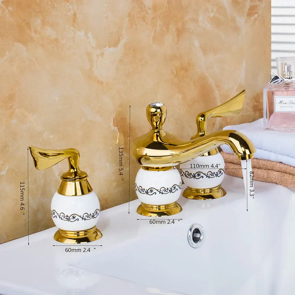 Golden plated bathroom faucet set with white ceramic handles and black ornate patterns by decorbites golden plated