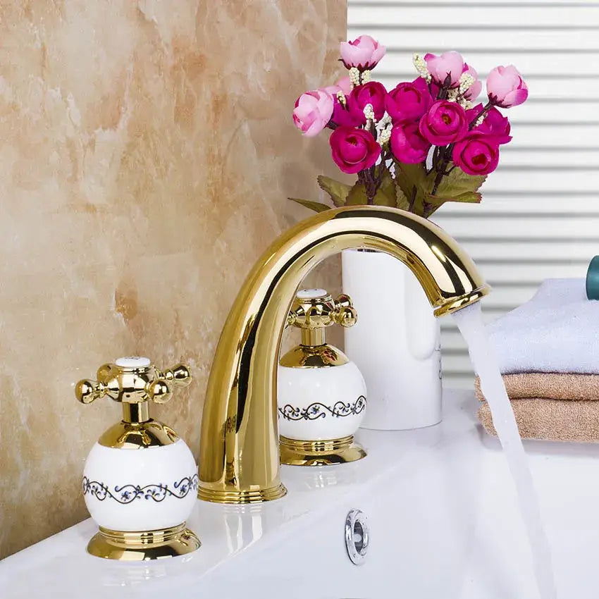 Golden plated bathroom faucet set with white ceramic handles featuring blue ornate patterns by decorbites golden plated