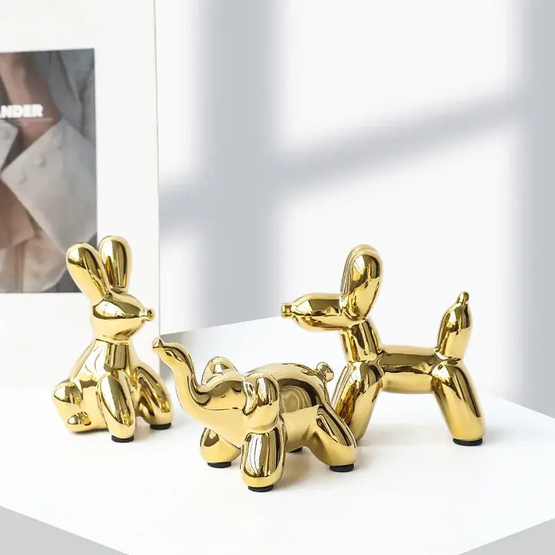 Golden glossy porcelain balloon animal desk ornament featuring rabbit elephant and dog for living room decorbites golden monkey