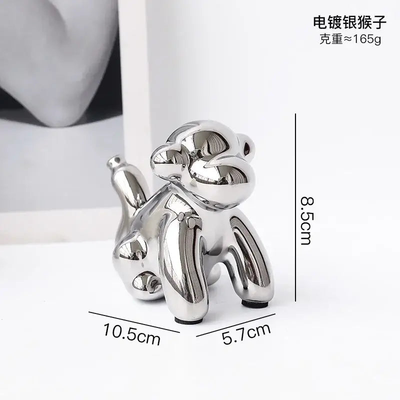 Shiny silver electroplated golden monkey desk ornament with sleek reflective surface for decorbites golden monkey decor