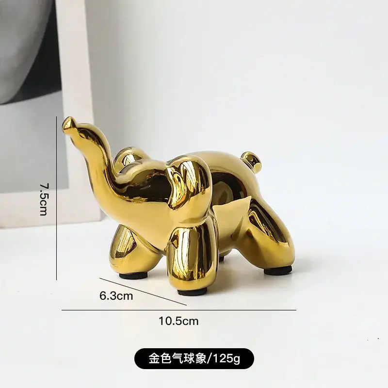 Golden porcelain balloon animal desk ornament with glossy finish black feet ideal for decorbites golden monkey decor