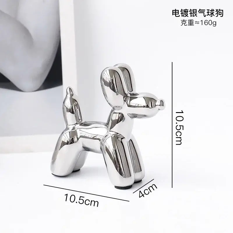 A sleek silver-plated balloon dog desk ornament with glossy finish ideal for decorbites golden monkey decor