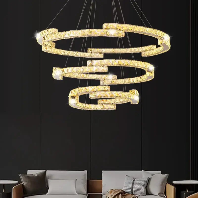 Golden spiral circular crystal pendant light with crystal accents and embedded lights for living room decorbites pendant light