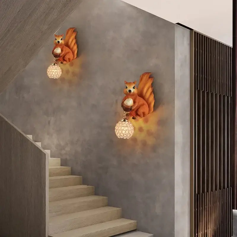 Golden squirrel cute squirrel wall lamps featuring orange squirrel shapes with textured warm-toned glass globe shades decorbites cute squirrel