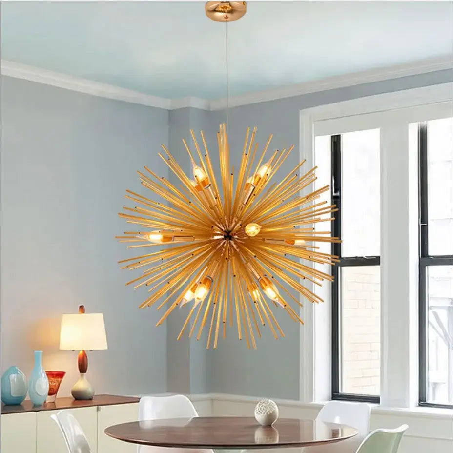 Golden starburst ball pendant lamp with exposed bulbs and slender metallic arms for living room decorbites golden ball pendant