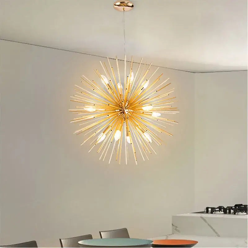 Golden starburst ball pendant lamp with slender metallic arms and warm glowing bulbs for living room decorbites golden ball