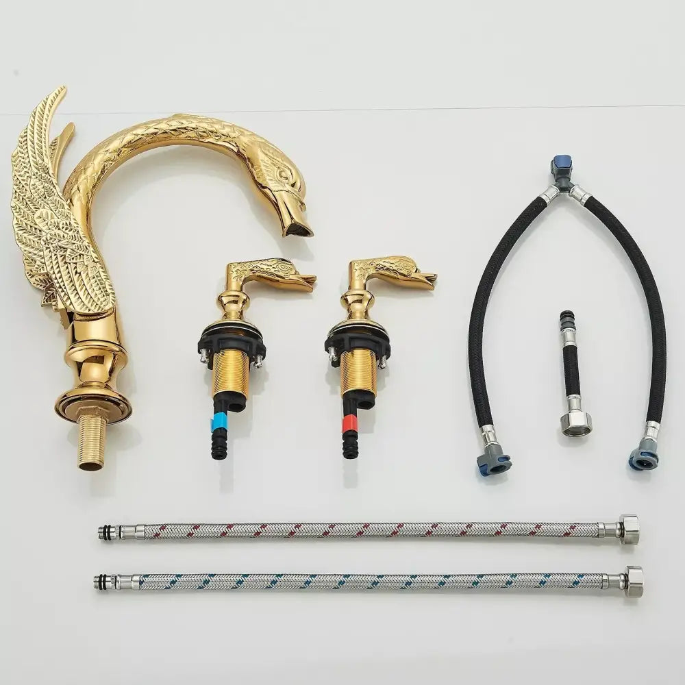 Golden swan dual handle deck mounted bathroom basin tap with cold water function and intricate feather detailing handles