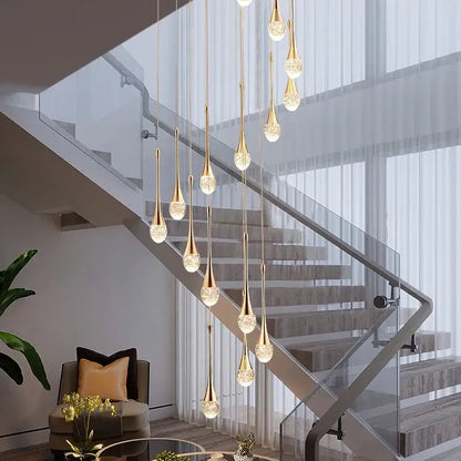 Elegant gold-toned pendant lights with crystal bubble ball accents in a modern cascading design for dining room decorbites crystal bubble