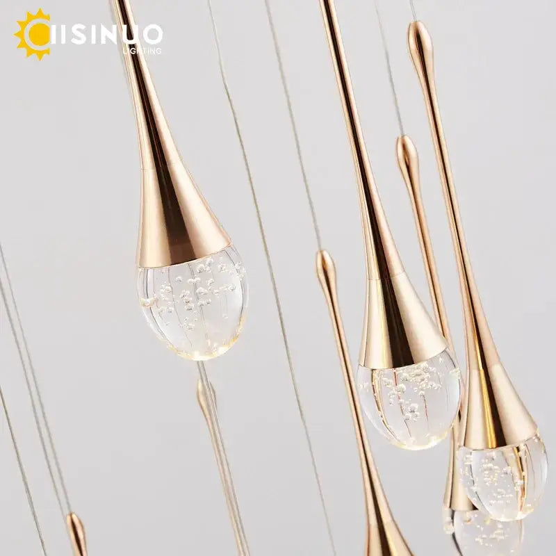 Gold-toned teardrop crystal staircase chandelier with clear glass globes and internal bubbles for living room decorbites crystal staircase