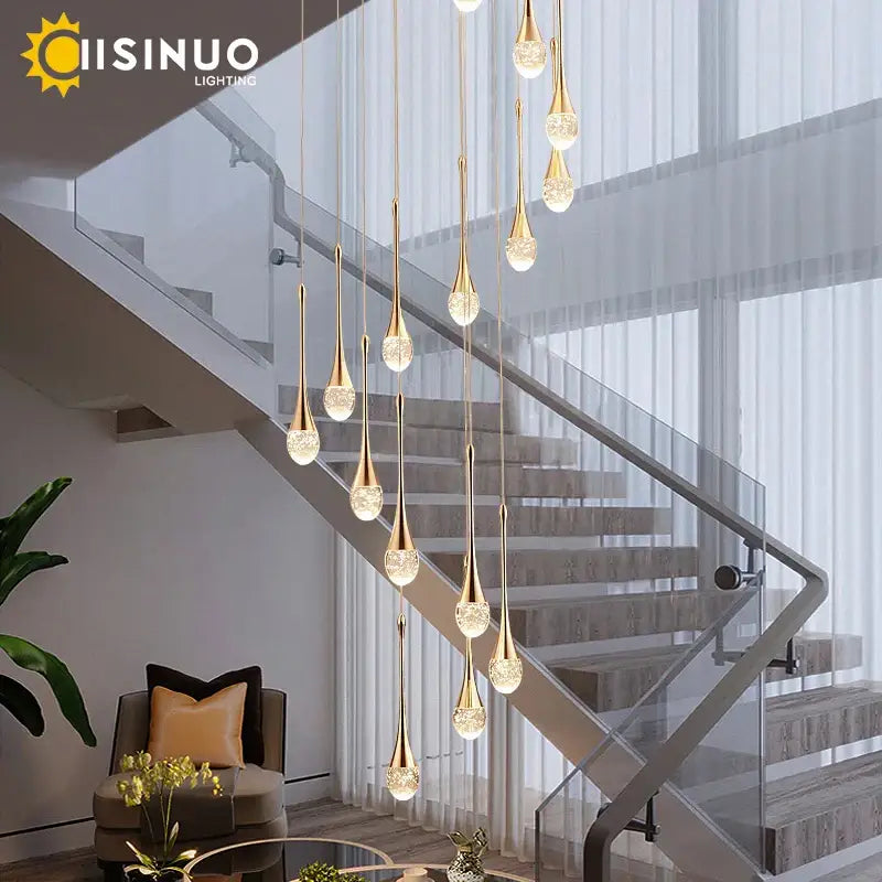 Gold-toned teardrop crystal staircase chandelier with decorbites crystal accents for elegant living room decorbites crystal staircase
