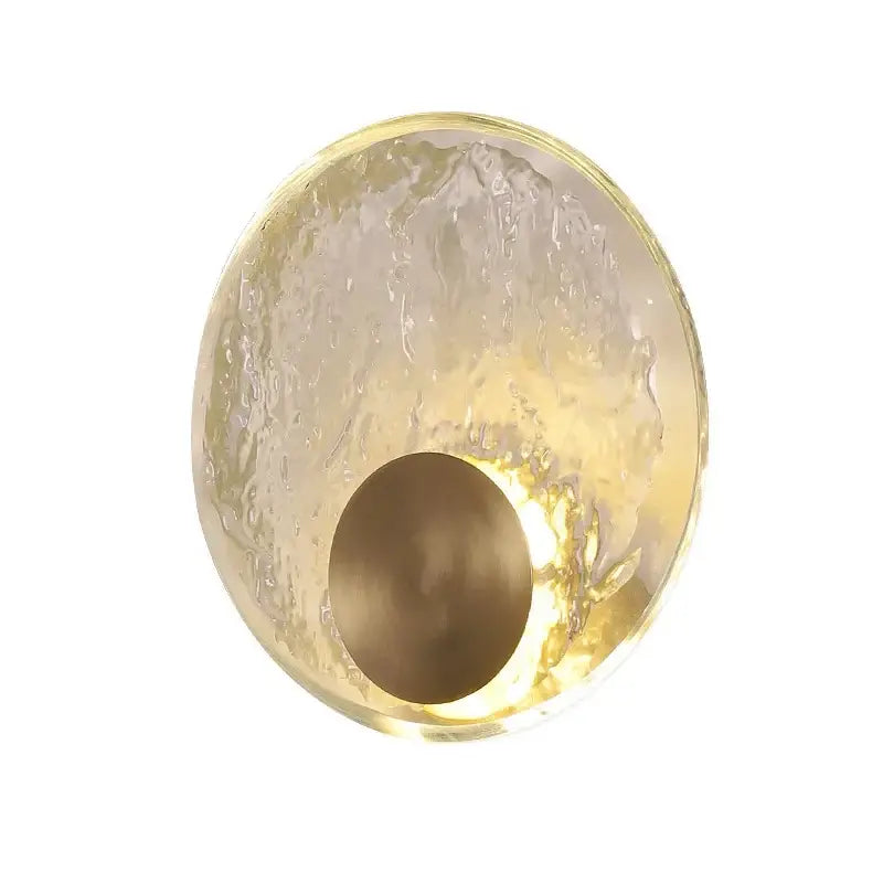 Golden textured elegance crystal wall lamp with translucent glass lampshade and metallic rim for bedroom or living room