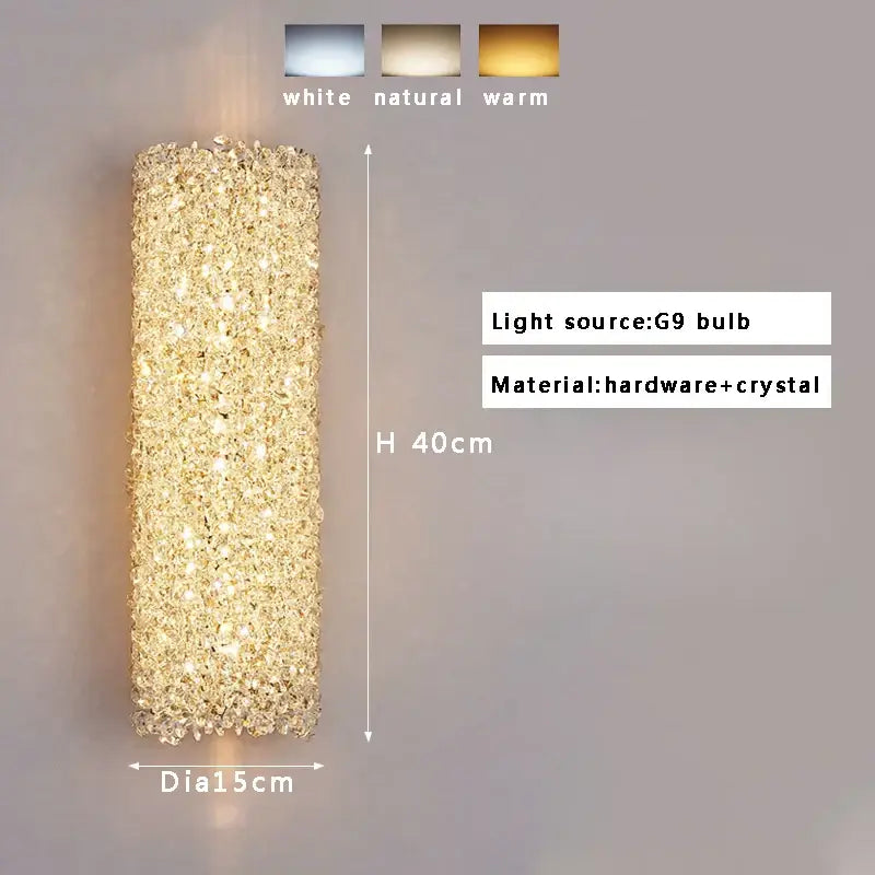 A 40cm tall golden textured glass wall lamp with decorbites crystal beads emitting warm living room illumination