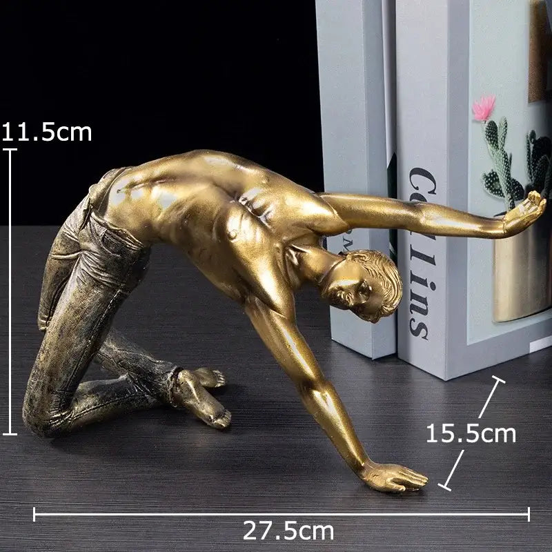 Golden thinker bodybuilder resin sculpture in metallic gold with detailed jeans for office desk decor