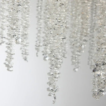 Clear faceted crystal beads in cascading strands on a golden tree branch crystal led ceiling chandelier decorbites branch crystal