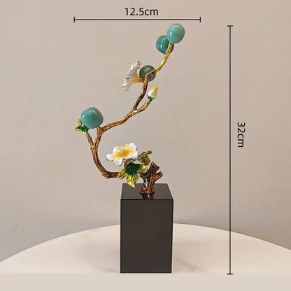 Golden tree plum blossom porcelain sculpture with turquoise orbs white blossoms and gold-leafed stems on black base