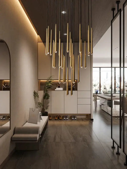 A modern golden water drop ceiling chandelier with slender cylindrical rods for living room decorbites crystal water drop lighting