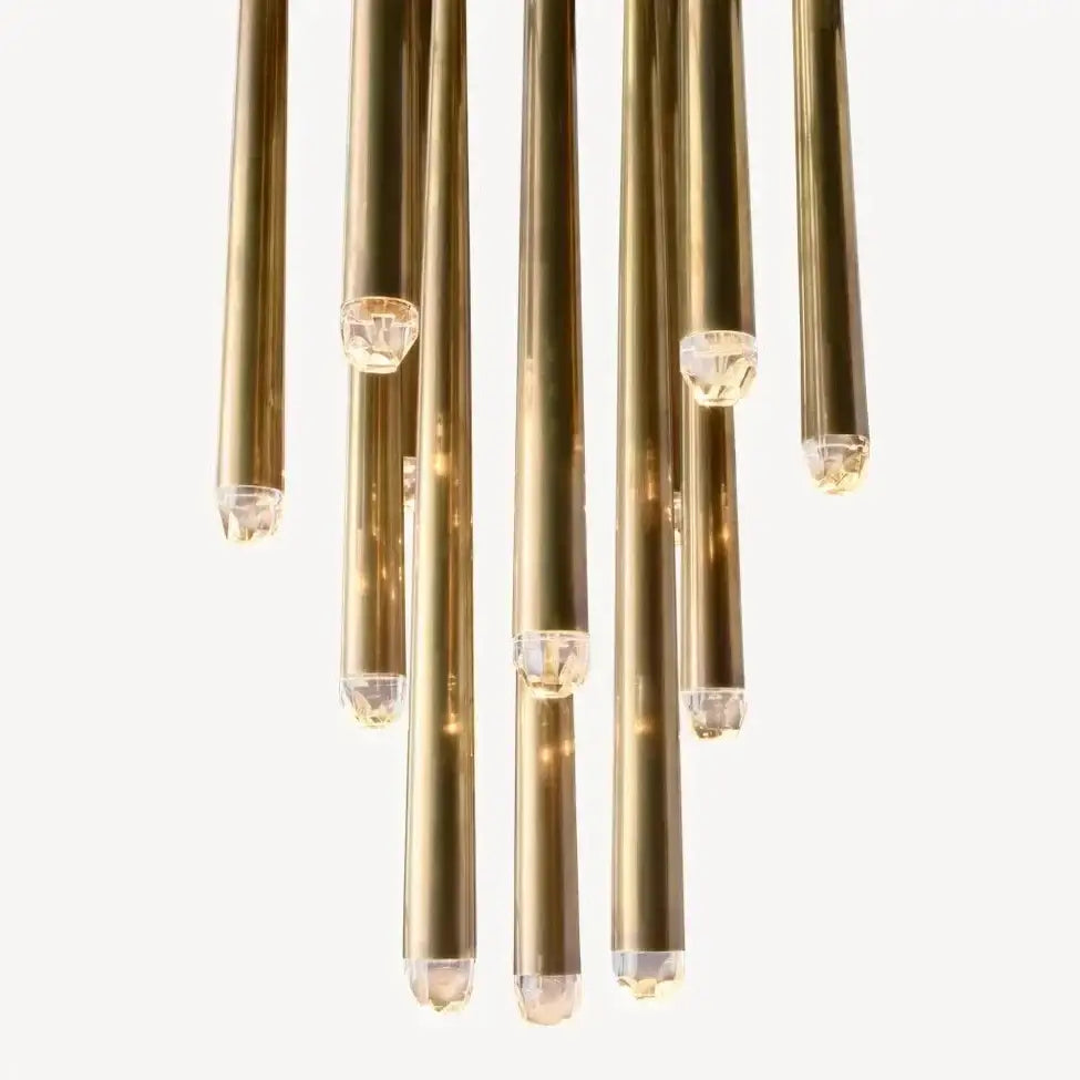 A modern golden water drop ceiling chandelier with polished brass tubes and crystal water drop accents for living room decorbites crystal water