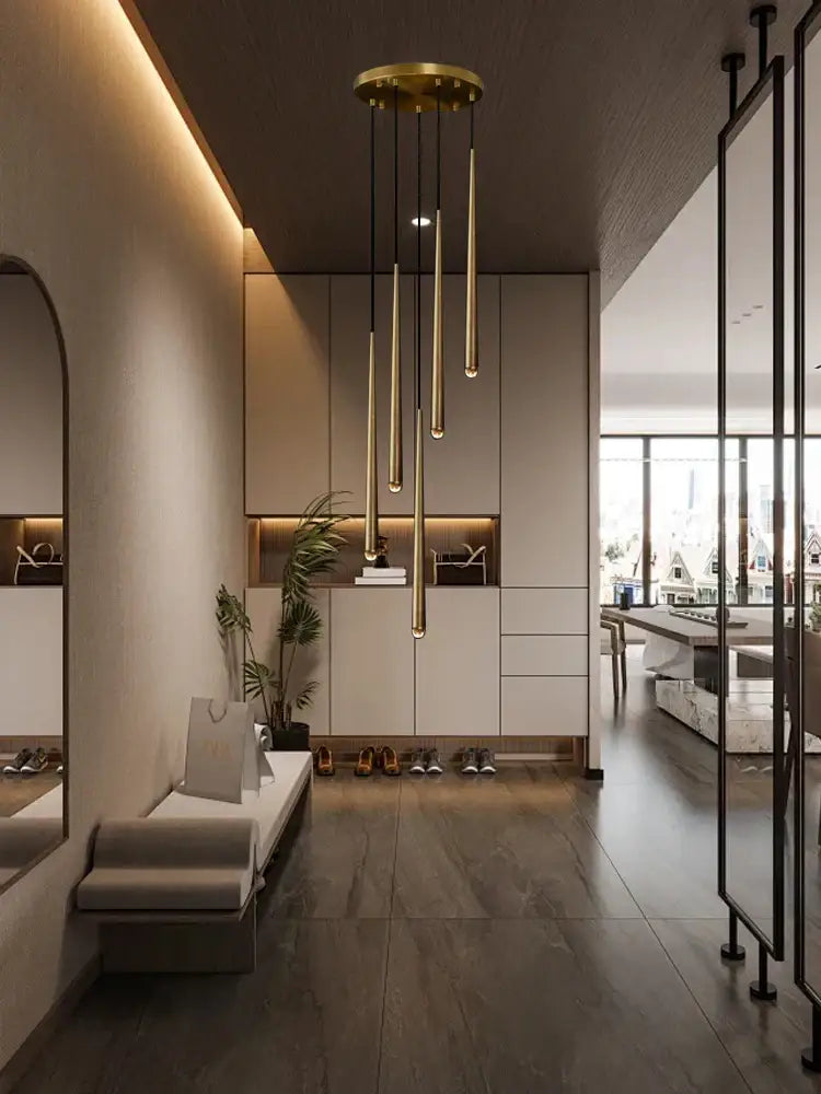 Gold-toned crystal water drop ceiling pendant lights hanging in a modern hallway for decorbites crystal water decor