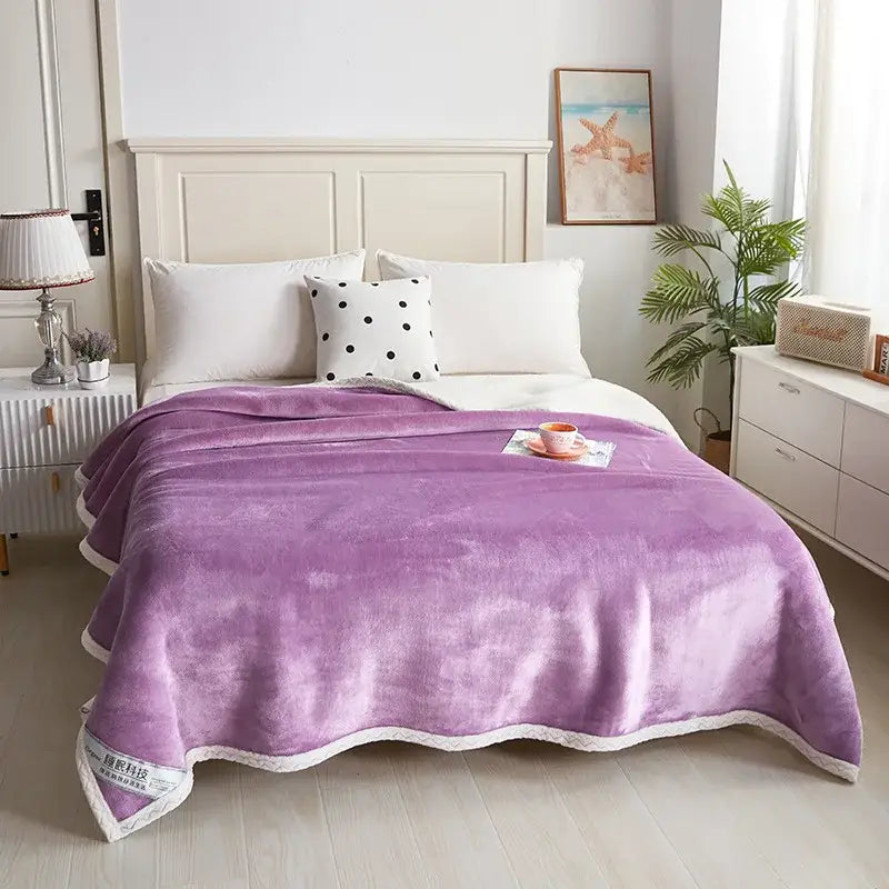 A plush lavender velvet sofa blanket with double-layer velvet construction and white scalloped edge trim for bedroom use